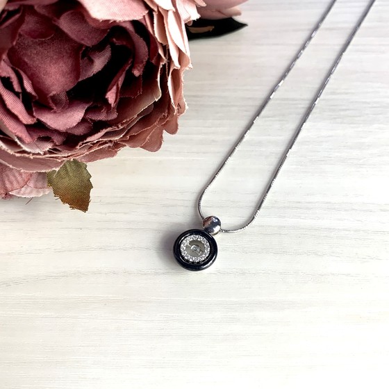 Silver pendant with ceramics