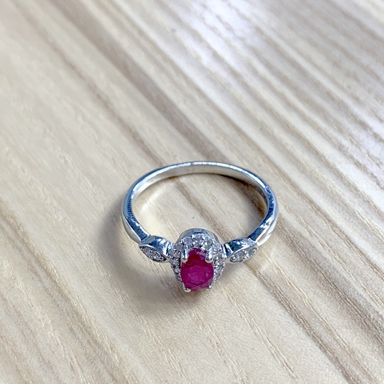 Silver ring with a ruby
