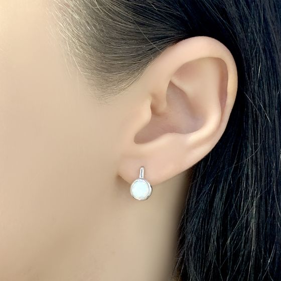 Silver earrings with a 0.65-carat opal