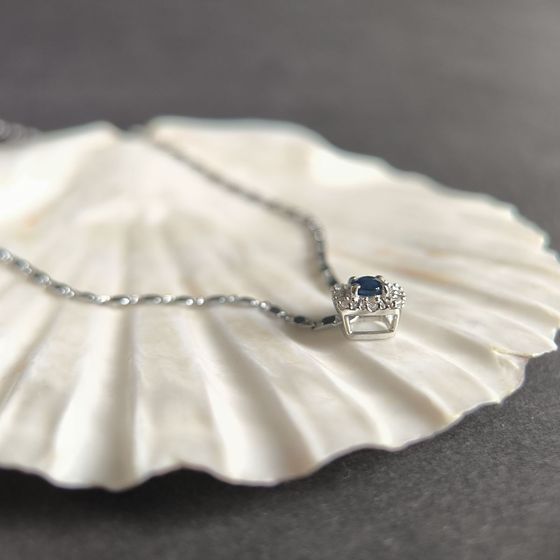 Срібна підвіска з сапфіром 0.48ct, фіанітами