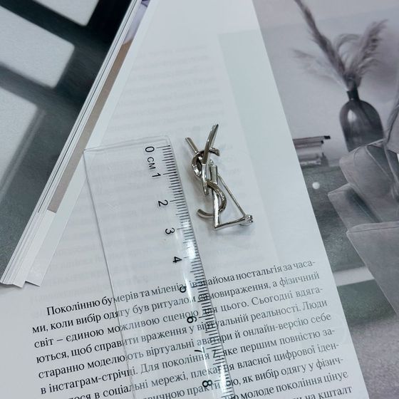 Silver brooch without stones