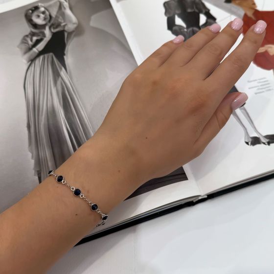 Silver bracelet with a sapphire