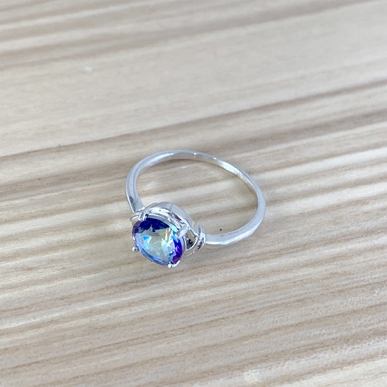 Silver ring with a mystic topaz