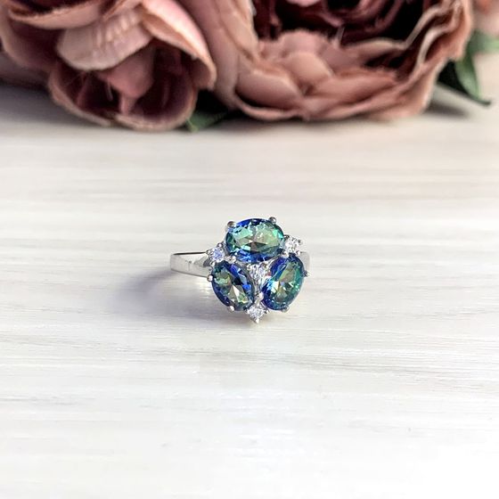 Silver ring with a mystic topaz