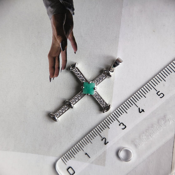 Silver cross with emerald and cubic zirconia