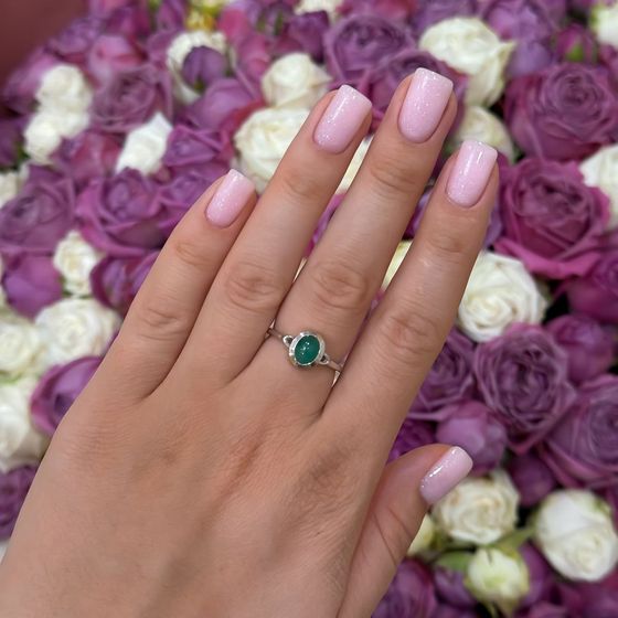 Silver ring with emerald
