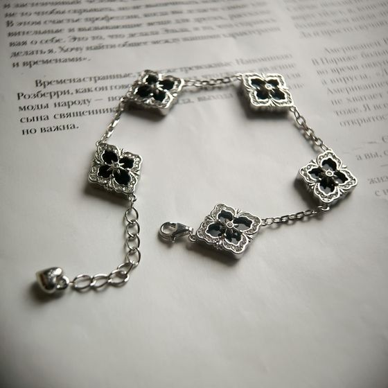 Silver bracelet with onyx, fianites