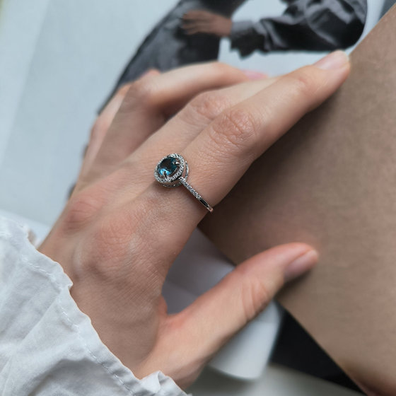 Silver ring with London Blue topaz and cubic zirconia