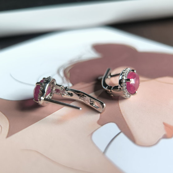 Silver earrings with a 3.97-carat ruby and cubic zirconia