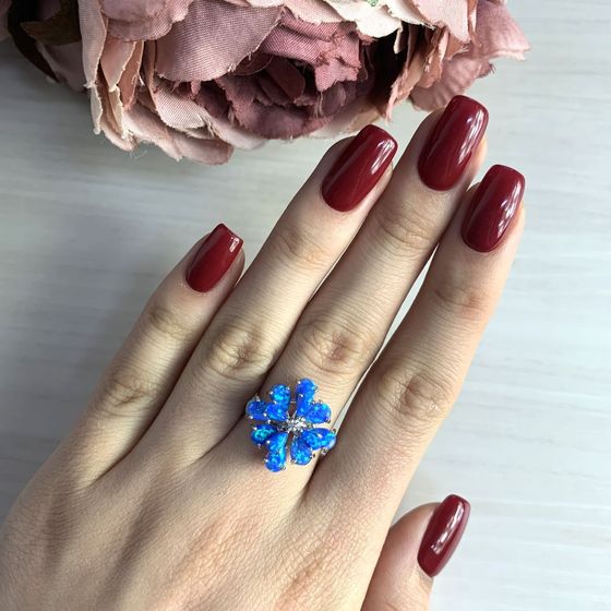 Silver ring with an opal