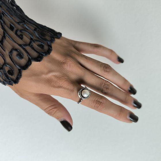 Silver ring with pearls