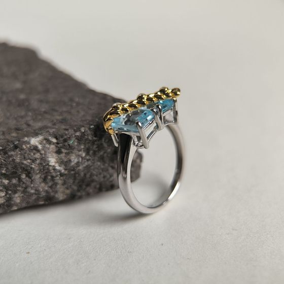 Silver ring with topaz, fianites