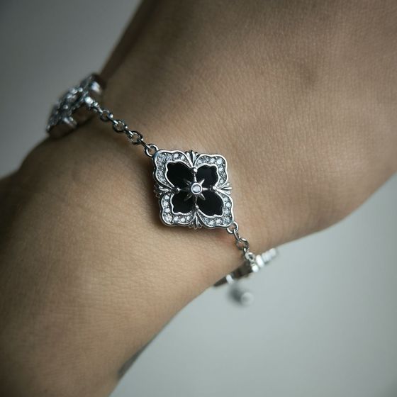 Silver bracelet with onyx, fianites
