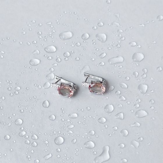 Silver earrings with 5.116 carats of sultanite