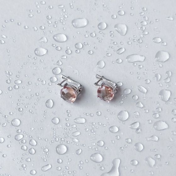 Silver earrings with 5.575 ct sultanaite