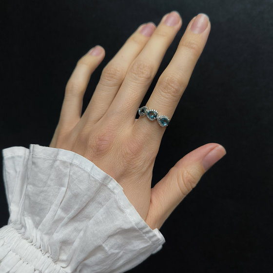 Silver ring with London Blue topaz and cubic zirconia