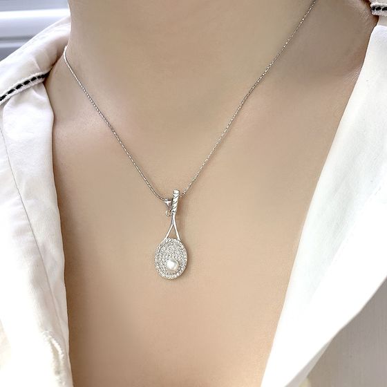 Silver pendant with fianites, pearls