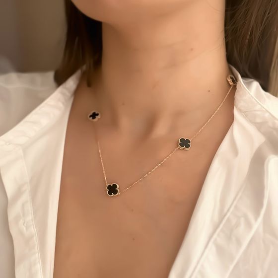 Золотое колье с ониксом