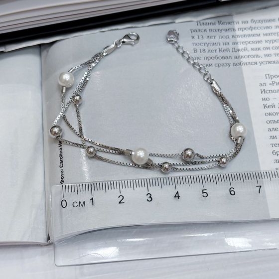 Silver bracelet with pearls