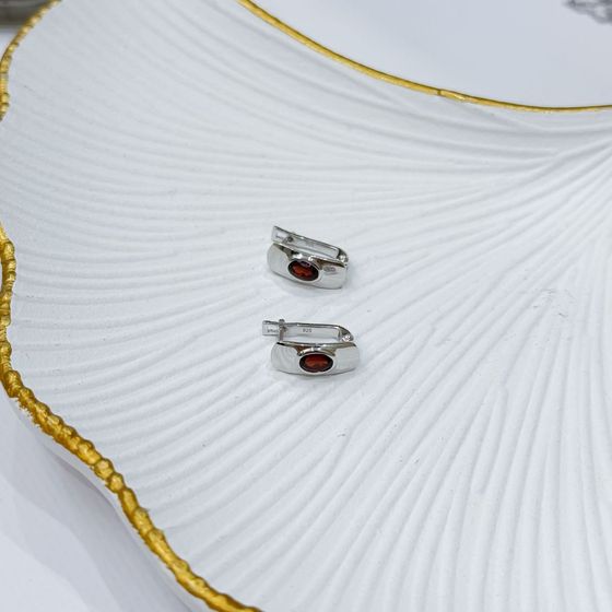 Срібні сережки з гранатом