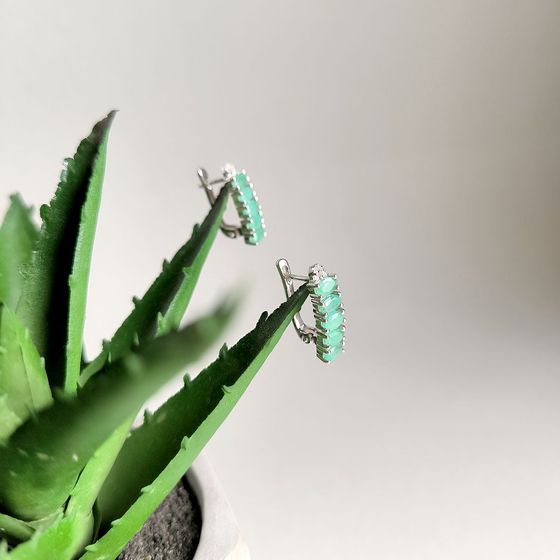 Silver earrings with emerald, fianites