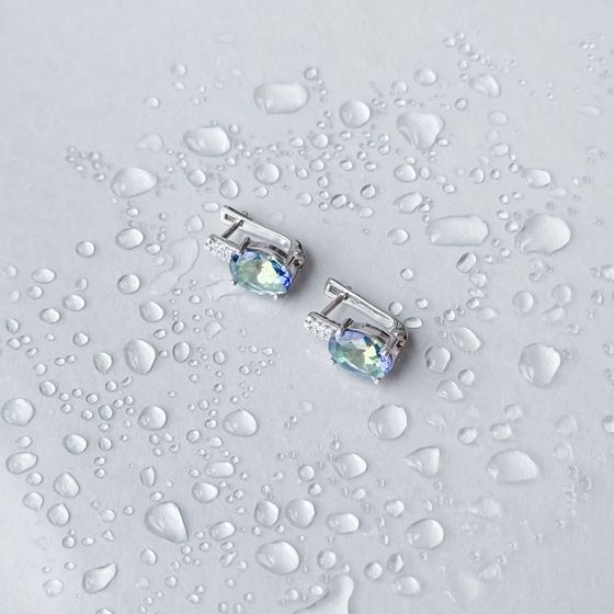 Silver earrings with a 3.817-carat mystic topaz