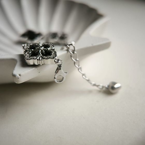 Silver bracelet with onyx, fianites