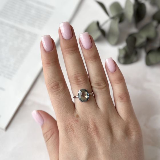 Silver ring with mystic topaz
