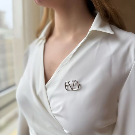 Silver brooch without stones