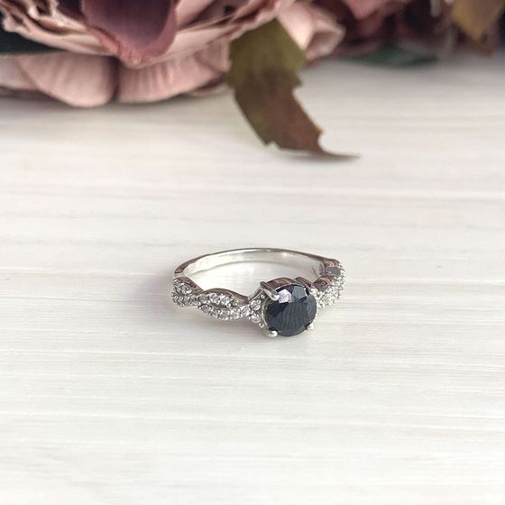 Silver ring with a sapphire