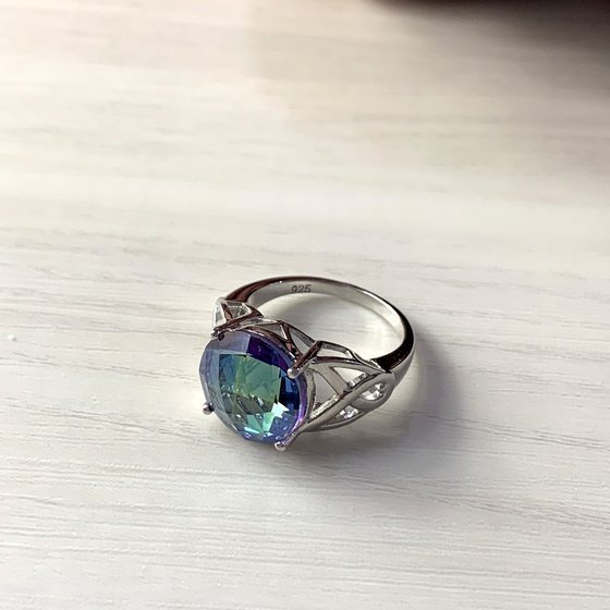 Silver ring with mystic topaz