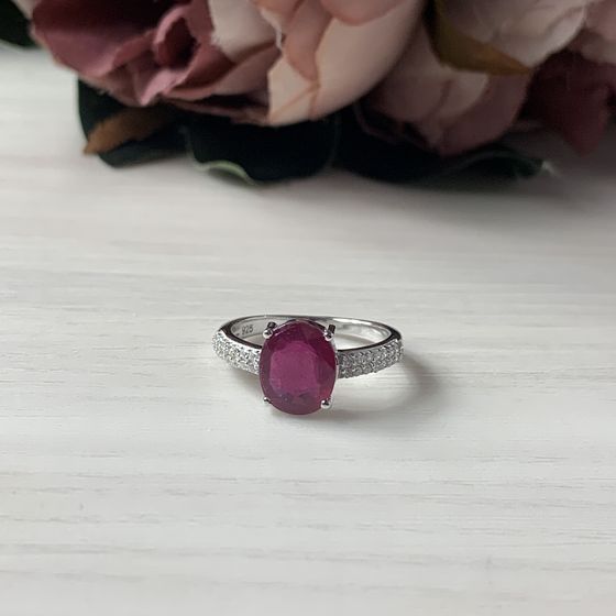 Silver ring with a ruby