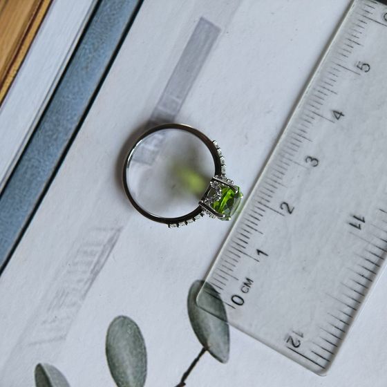 Silver ring with chrysolite