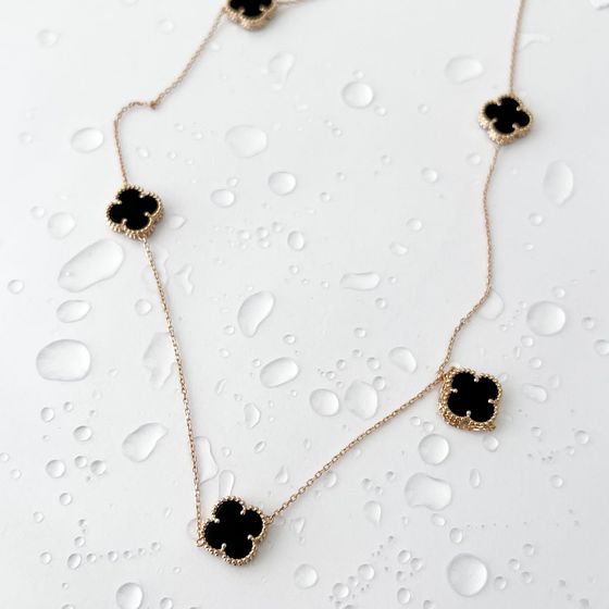 Золотое колье с ониксом