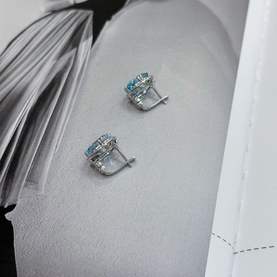 Срібні сережки з топазом 12,432 карата та фіанітами