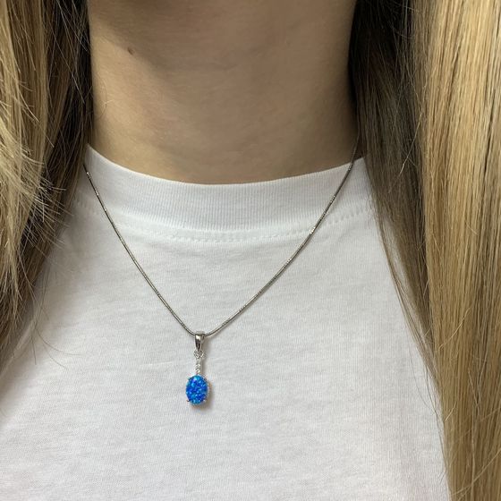 Silver pendant with opal