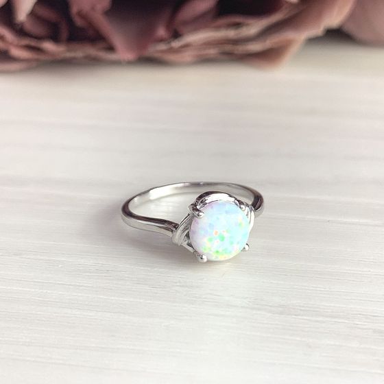 Silver ring with a 0.69-carat opal