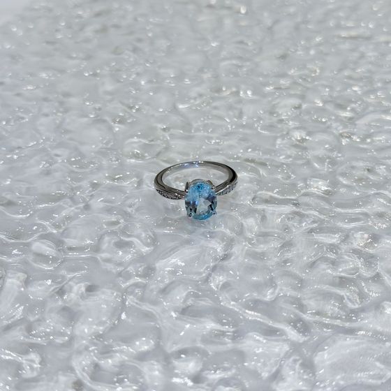 Silver ring with a topaz