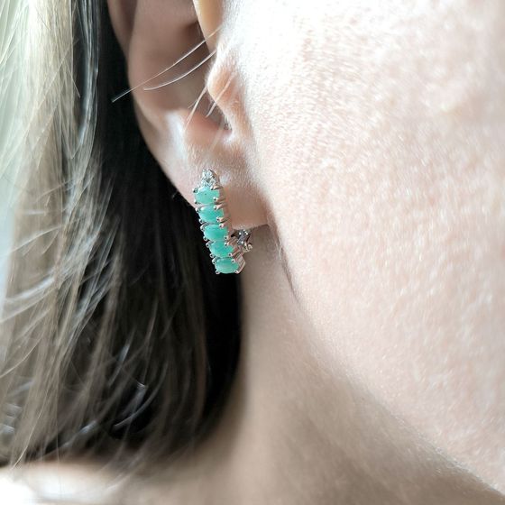 Silver earrings with emerald, fianites