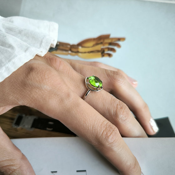 Silver ring with a 3.287-carat chrysolite