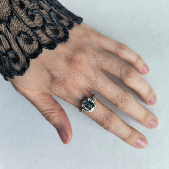 Silver ring with mystic topaz