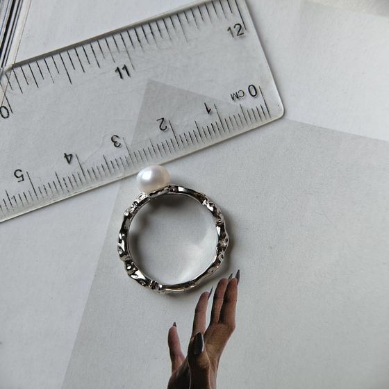 Silver ring with pearls