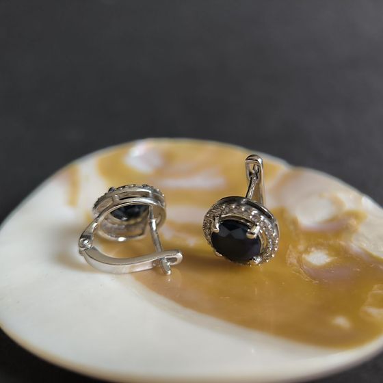 Sterling silver earrings with 5.916ct sapphire, pave diamonds
