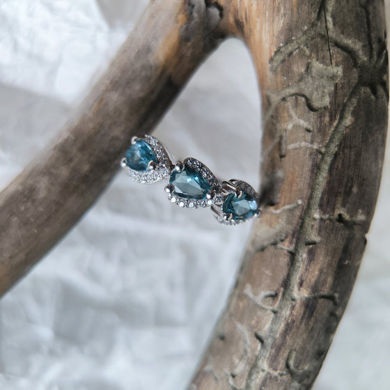 Silver ring with London Blue topaz and cubic zirconia