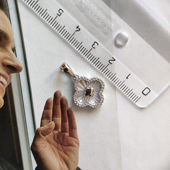 Silver pendant with cubic zirconia and mother-of-pearl