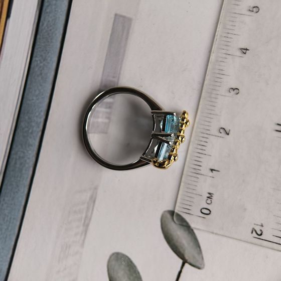 Silver ring with topaz, fianites