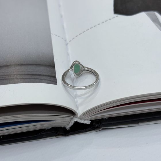 Silver ring with emerald