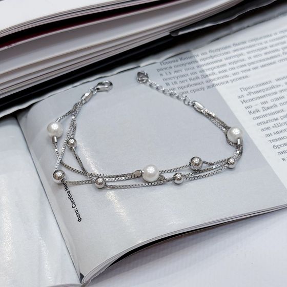 Silver bracelet with pearls