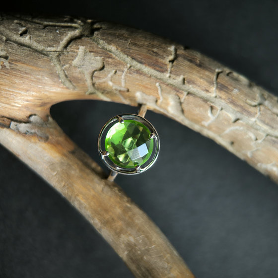 Silver ring with a 3.287-carat chrysolite
