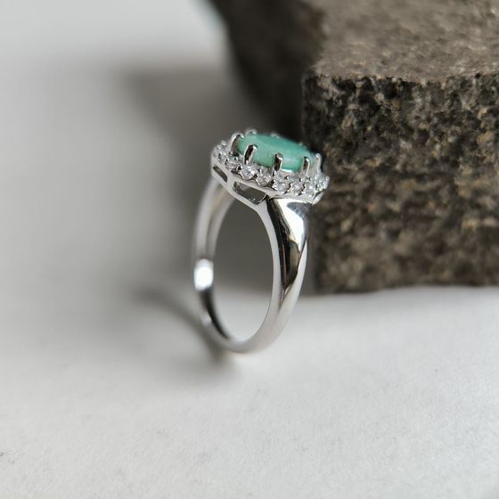 Silver ring with emerald, fianites